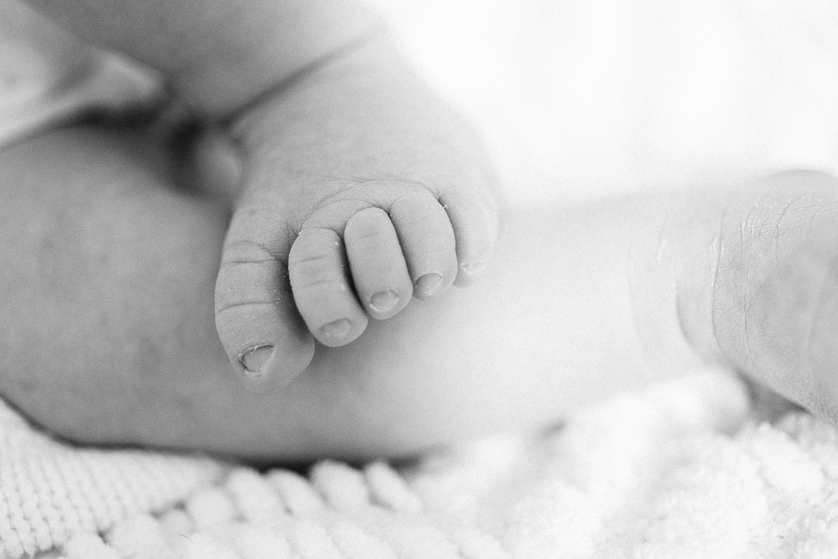 Closeup of a newborn baby's hands.